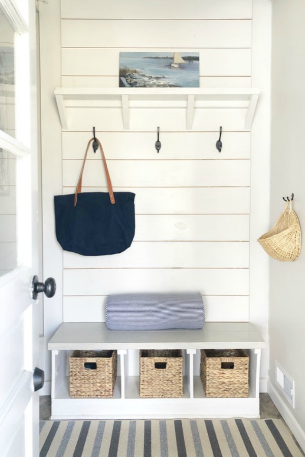 Shiplap on mud room entry with bench.