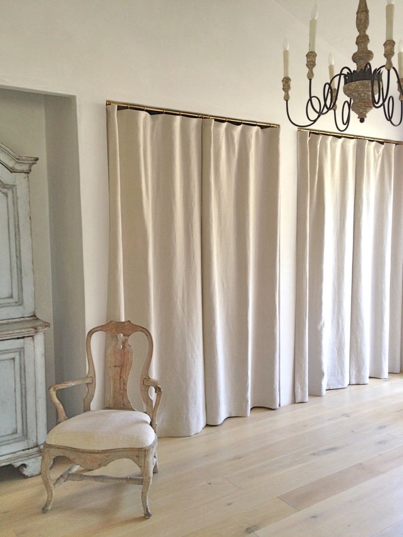 Patina Farm master bedroom closets with linen drapes. Giannetti Home.