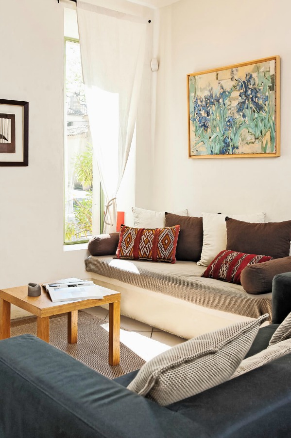 Modern furniture in a lounge space within a French farmhouse in Provence.