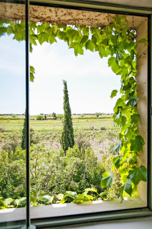 French countryside view. Provence dreams are made of these! Come tour French Farmhouse Design: Provence Villa Photos in a story with rustic decor, Country French charm, and South of France beauty! #frenchfarmhouse #interiordesign #housetour #frenchcountry #provence