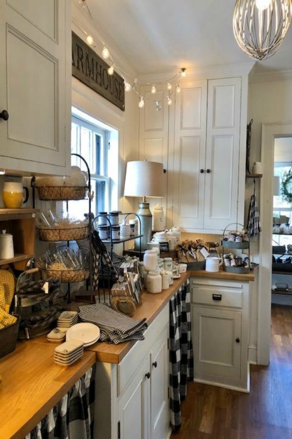 Farmhouse kitchen decor and black and white check accents in a country kitchen. #urbanfarmgirl