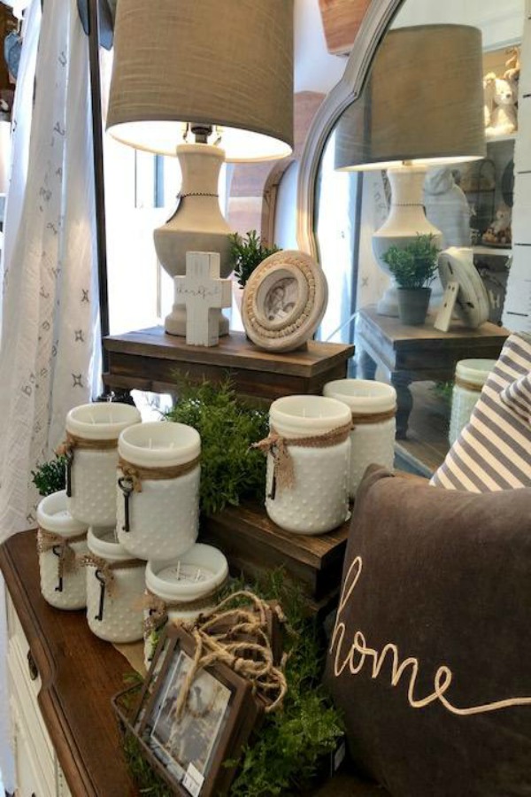 White milkglass jars with candles at Urban Farmgirl. Photo by Hello Lovely Studio.