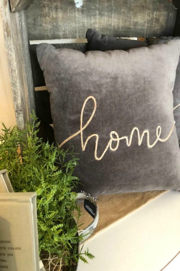 Grey velvet pillow with 'home' embroidery at Urban Farmgirl.