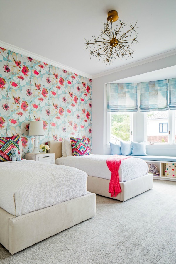 Vibrant and chic, poppies and turquoise are cheerful design elements in a kids bedroom by Ike Kligerman Barkley.