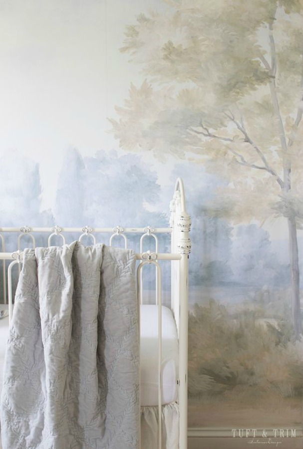 Detail of a magnificent landscape mural wallpaper in a nursery designed by Tufty & Trim. Mural is made from an original painting by Susan Harter. Muted and sophisticated colors in this beautifully inspiring interior design. #mural #interiordesign #timeless #ethereal #serenedecor #paintedmural #wallpaper