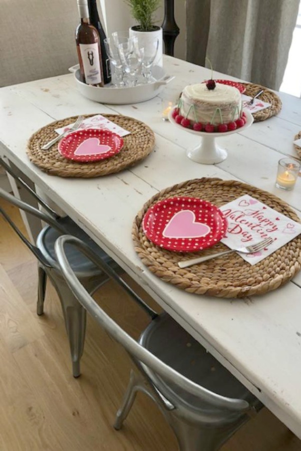 Vintage Valentine Decorations & Layer Cake. Come find simple inspiration for EASY, old fashioned, heart and love themed ideas like this simple layer cake with cherry lollipops and vintage cards on Hello Lovely Studio. #valentinesday #decorations #tablescape #layercake #vintagevalentinecards