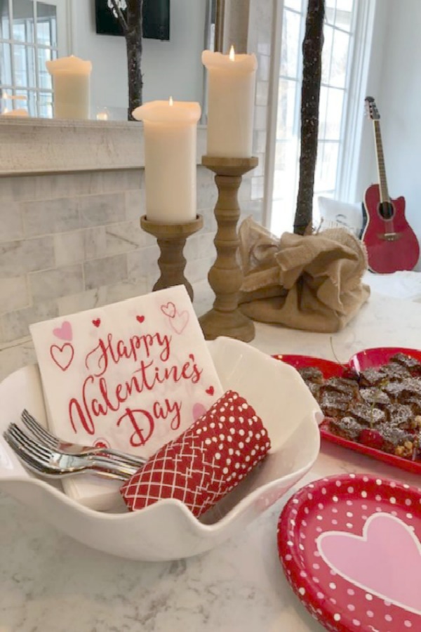 Vintage Valentine Decorations & Layer Cake. Come find simple inspiration for EASY, old fashioned, heart and love themed ideas like this simple layer cake with cherry lollipops and vintage cards on Hello Lovely Studio. #valentinesday #decorations #tablescape #layercake #vintagevalentinecards