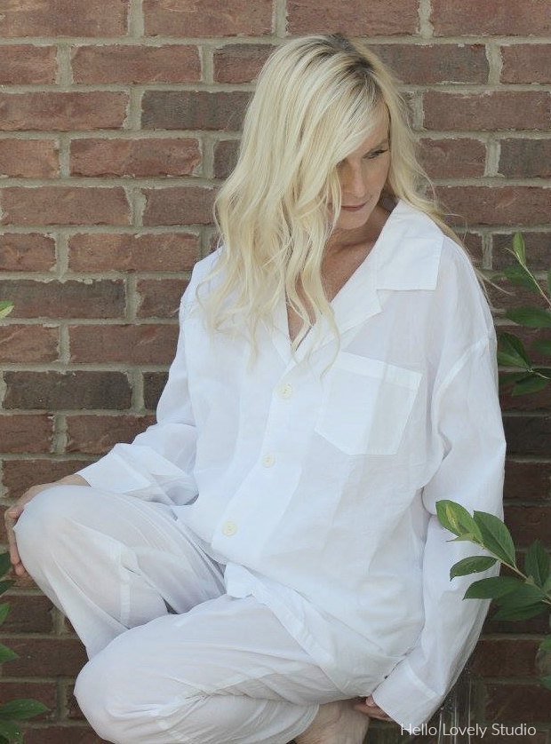 Michele of Hello Lovely Studio in white men's style pajamas.