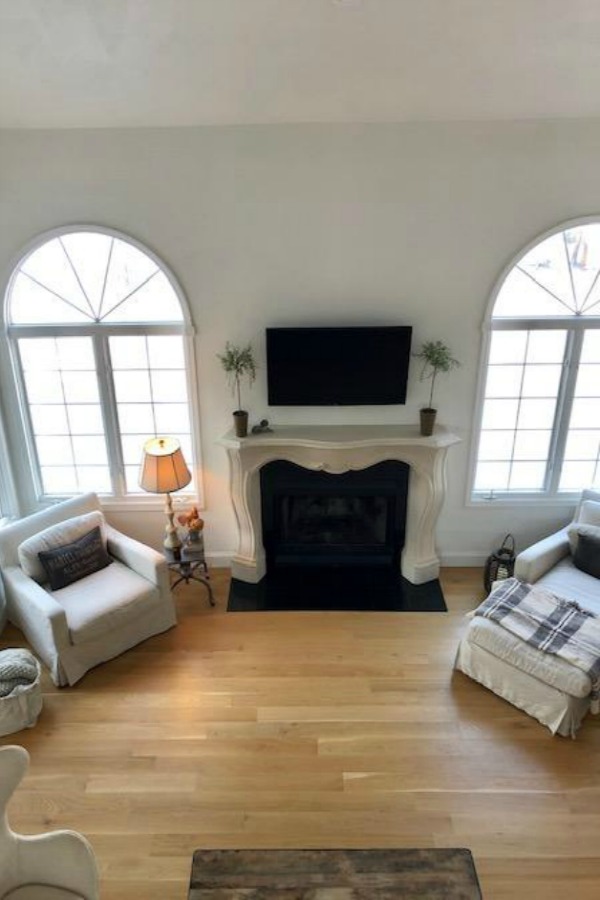 White oak hardwood flooring and Belgian linen living room furniture - Hello Lovely Studio.