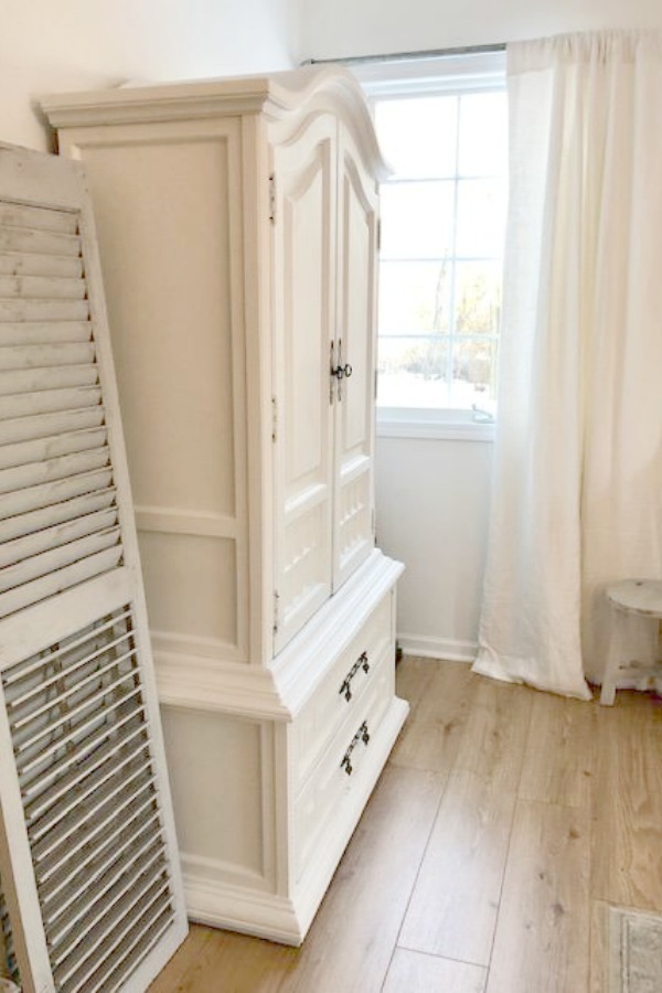 White armoire and rustic shutters painted Annie Sloan Paris Gray by Hello Lovely Studio.