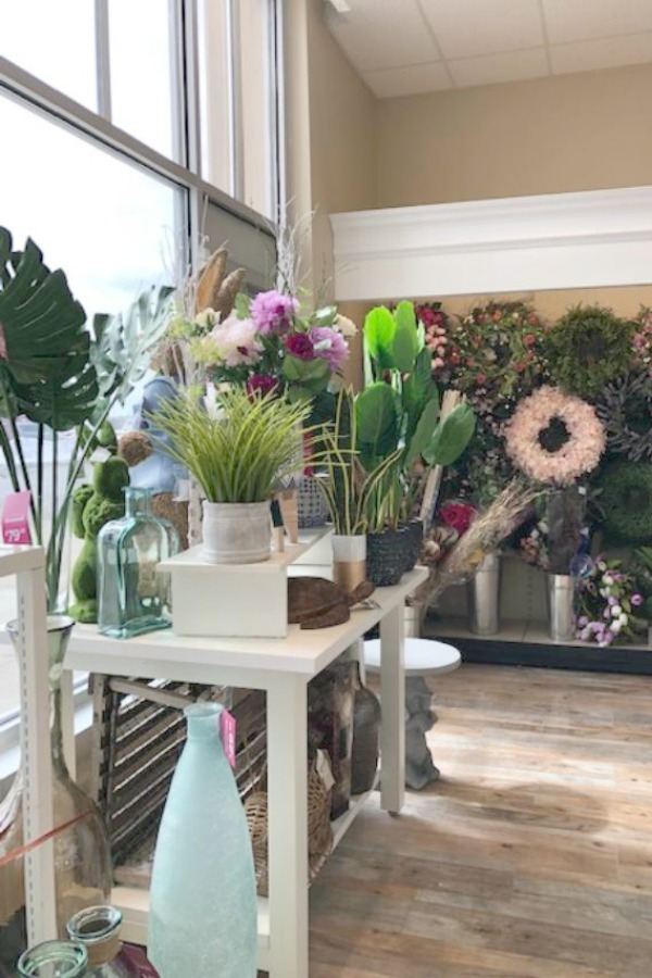 Everlasting flowers and greenery in a shop. French Farmhouse Decor & Lightening Up for Spring - Hello Lovely Studio.