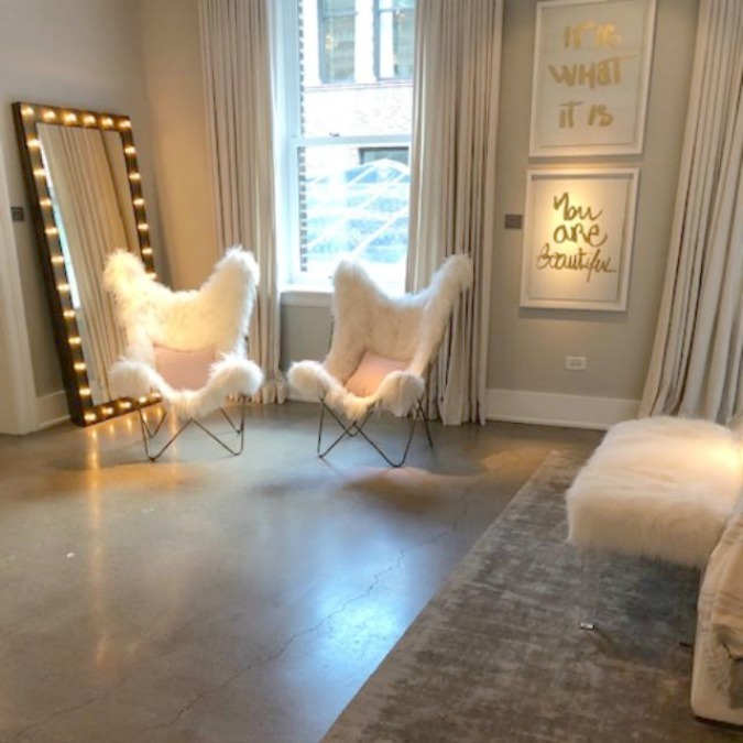 Sheepskin butterfly chairs in a RH child bedroom. Photo: Hello Lovely Studio. Come tour photos of Restoration Hardware: Romantic French Decor Ideas on Hello Lovely Studio.