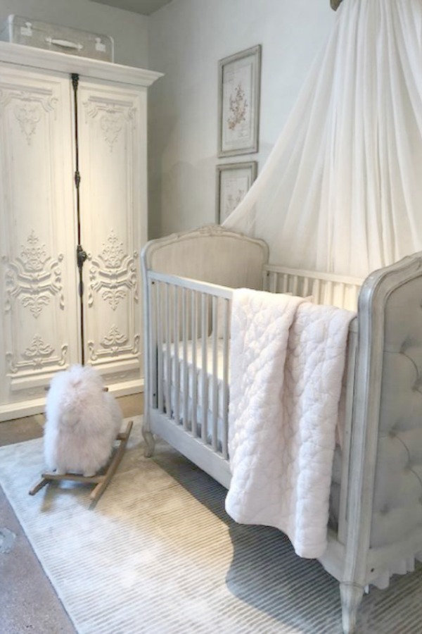 White nursery in a RH Child French inspired moment at RH Gallery Chicago. Photo: Hello Lovely Studio. Come tour photos of Restoration Hardware: Romantic French Decor Ideas on Hello Lovely Studio.