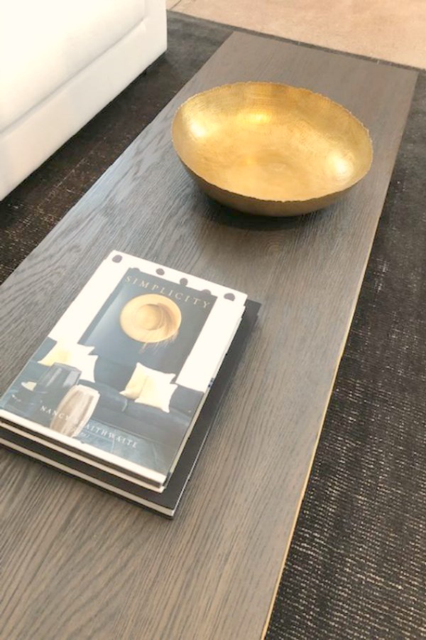 Modern and minimal living room coffee table moment at RH Gallery Chicago. Photo: Hello Lovely Studio.