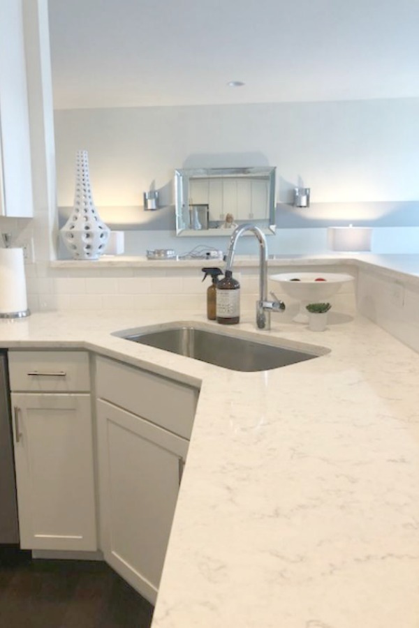 White kitchen with Viatera Minuet quartz countertops - Hello Lovely Studio.