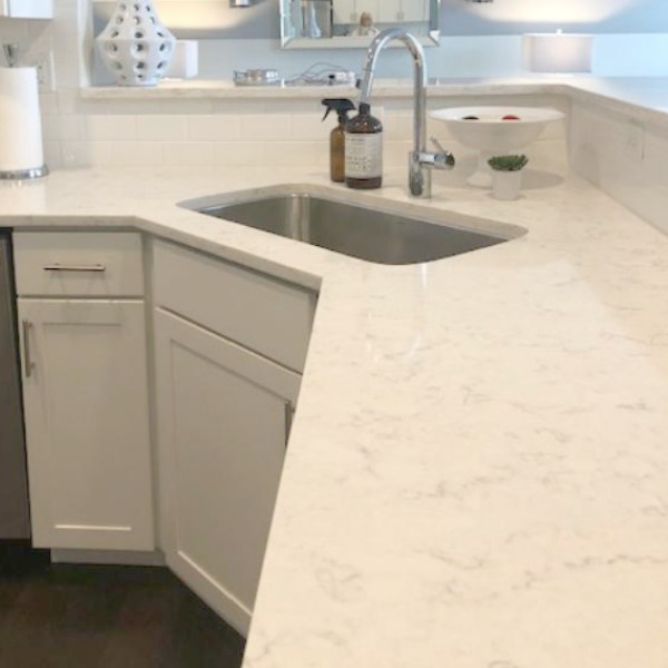 White kitchen with Viatera Minuet quartz countertops - Hello Lovely Studio.