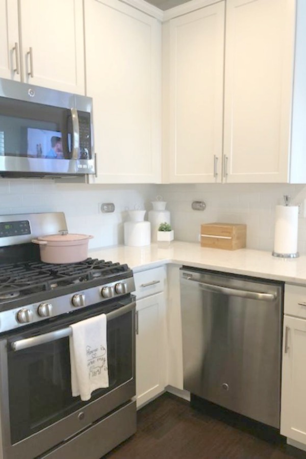 White kitchen with Viatera Minuet quartz countertops - Hello Lovely Studio.