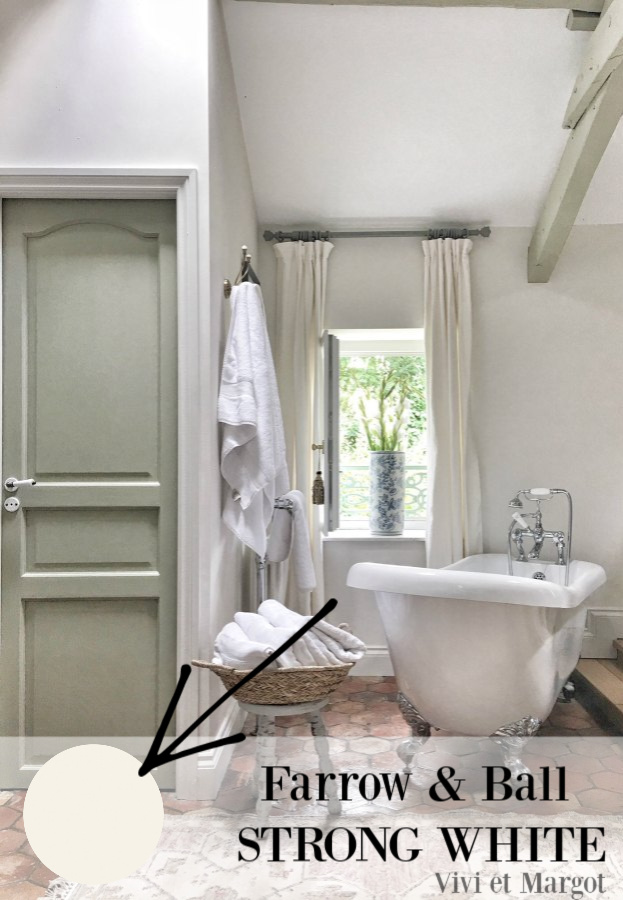 Farrow & Ball Strong White paint color in a gorgeous French farmhouse bathroom by Vivi et Margot on Hello Lovely Studio. #paintcolors #farrowandballstrongwhite #bestwhites #bestwhitepaint #bathroom #interiordesign