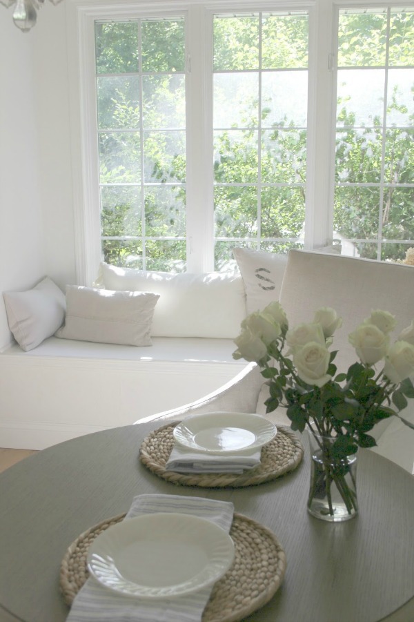 Serene kitchen window seat bench and breakfast table - Hello Lovely Studio.