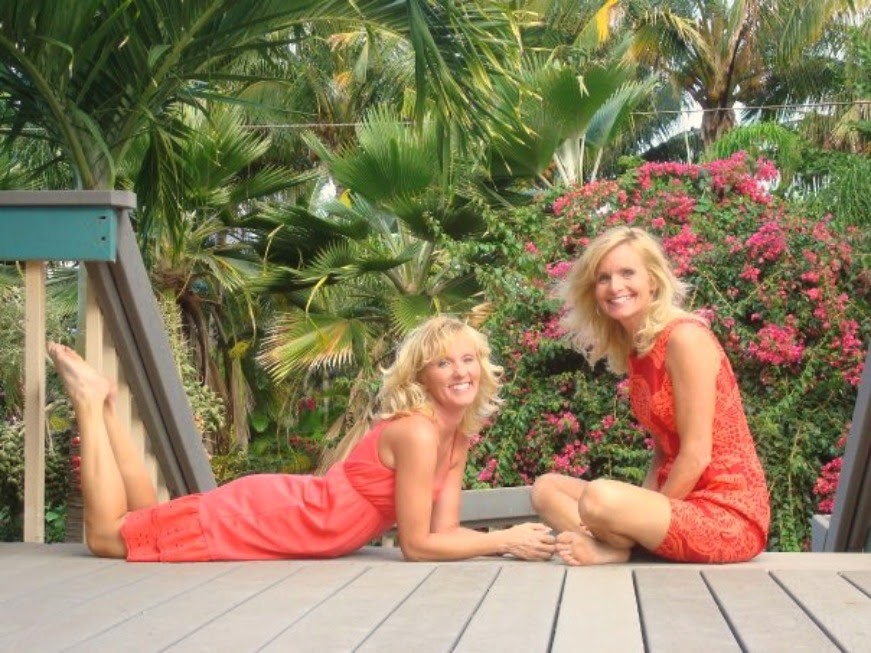Michele of Hello Lovely Studio in Hawaii with coral Tabitha dress from Anthropologie.