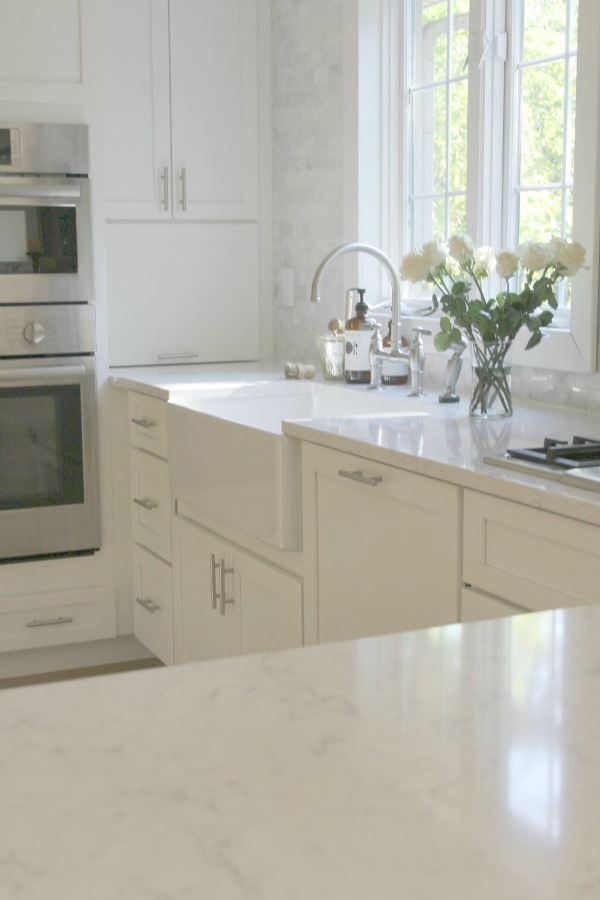 White kitchen with Viatera Minuet quartz countertops - Hello Lovely Studio.