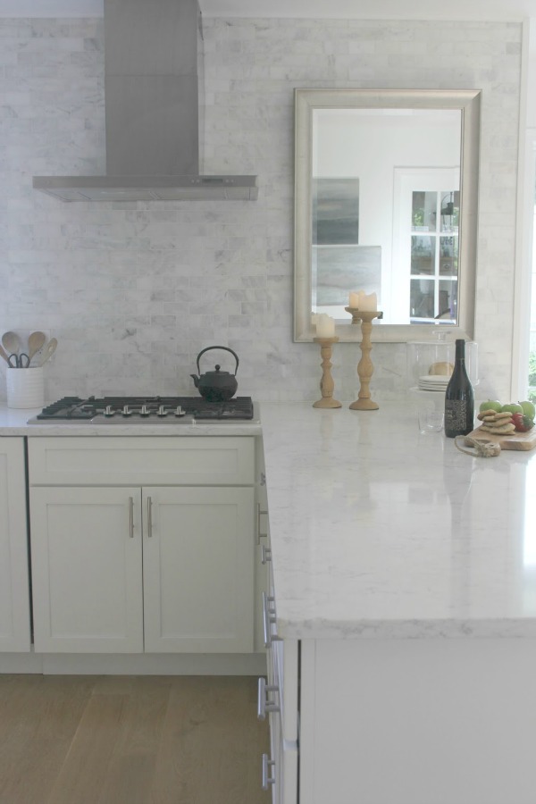 White kitchen with Viatera Minuet quartz countertops - Hello Lovely Studio.