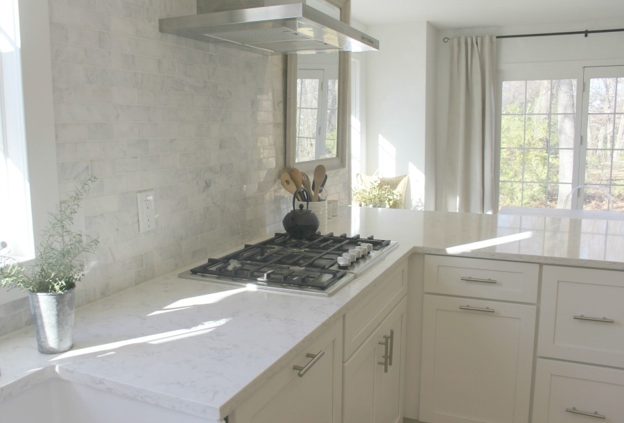 White kitchen with Viatera Minuet quartz countertops - Hello Lovely Studio.
