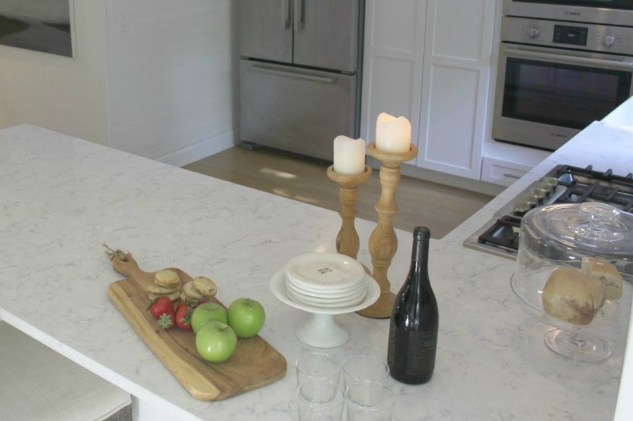 White kitchen with Viatera Minuet quartz countertops - Hello Lovely Studio.