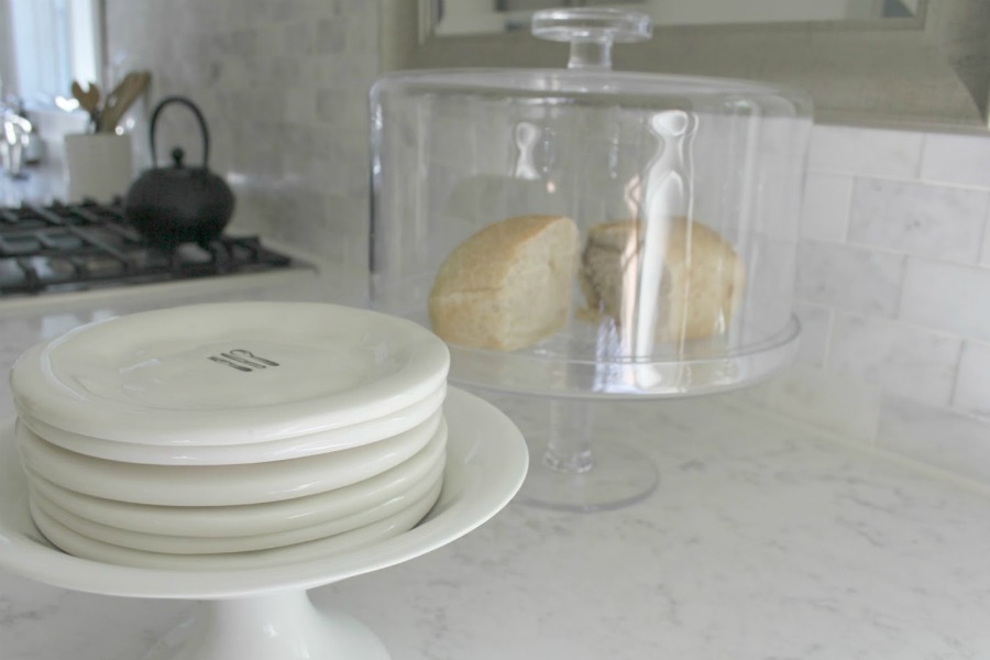 White kitchen with Viatera Minuet quartz countertops - Hello Lovely Studio.