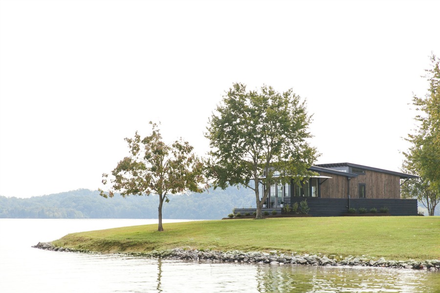 Tiny house beautiful! This saltbox style designer cottage by architect Jeffrey Dungan is offered at The Retreat by Oakstone.