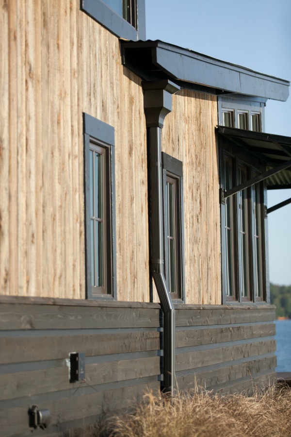 Tiny house beautiful! This saltbox style designer cottage by architect Jeffrey Dungan is offered at The Retreat by Oakstone.