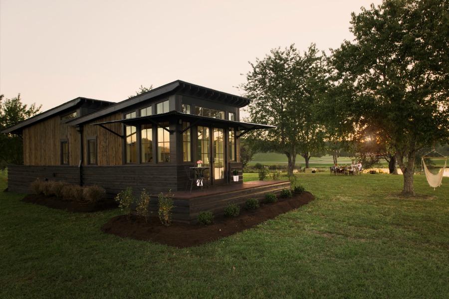 Tiny house beautiful! This saltbox style designer cottage by architect Jeffrey Dungan is offered at The Retreat by Oakstone.