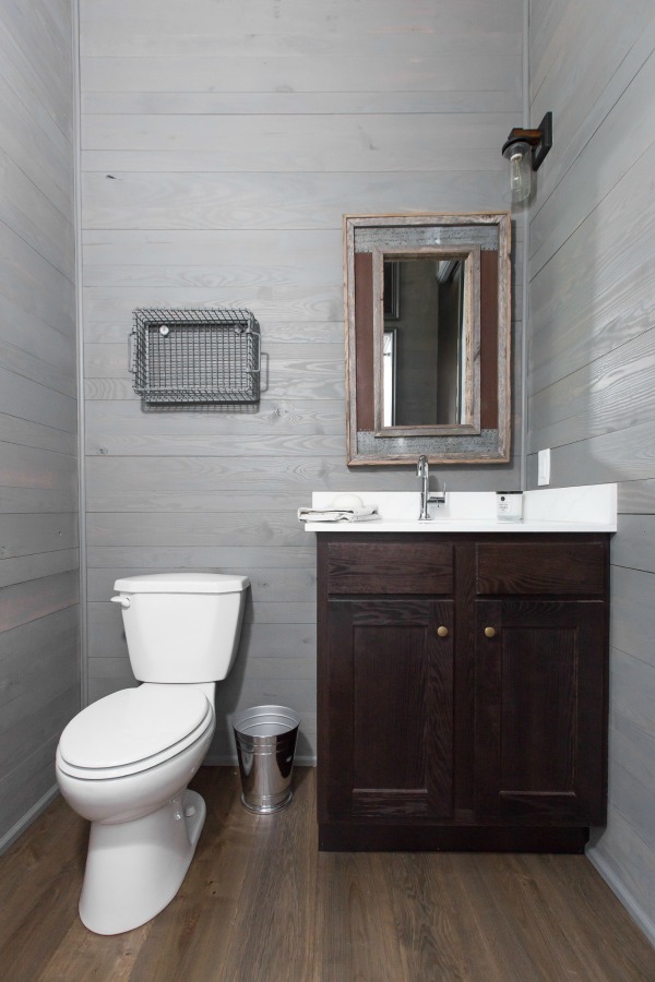 Tiny house design by Jeffrey Dungan, an exquisitely crafted luxurious Low Country style Designer Cottage at The Retreat at Oakstone.