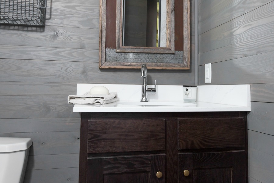 Tiny house design by Jeffrey Dungan, an exquisitely crafted luxurious Low Country style Designer Cottage at The Retreat at Oakstone.