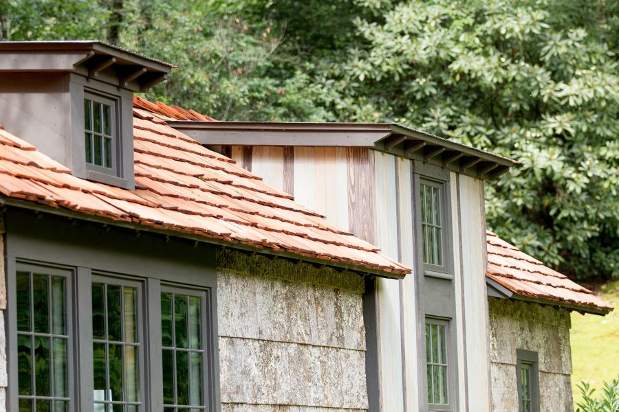 Tiny house exterior architectural details - designed by Jeffrey Dungan, an exquisitely crafted luxurious Low Country style Designer Cottage at The Retreat at Oakstone.