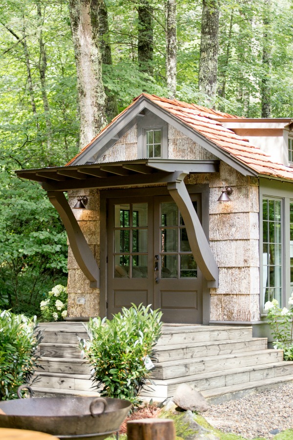 Glorious tiny house architecture and exterior porch designed by Jeffrey Dungan, an exquisitely crafted luxurious Low Country style Designer Cottage at The Retreat at Oakstone.