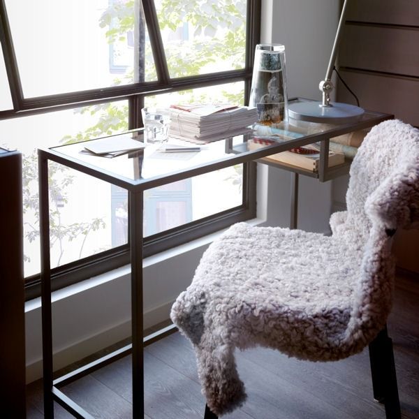 Cozy vignette with Ikea Vittsjo laptop table and a fleecy covered chair. Jornalogora.