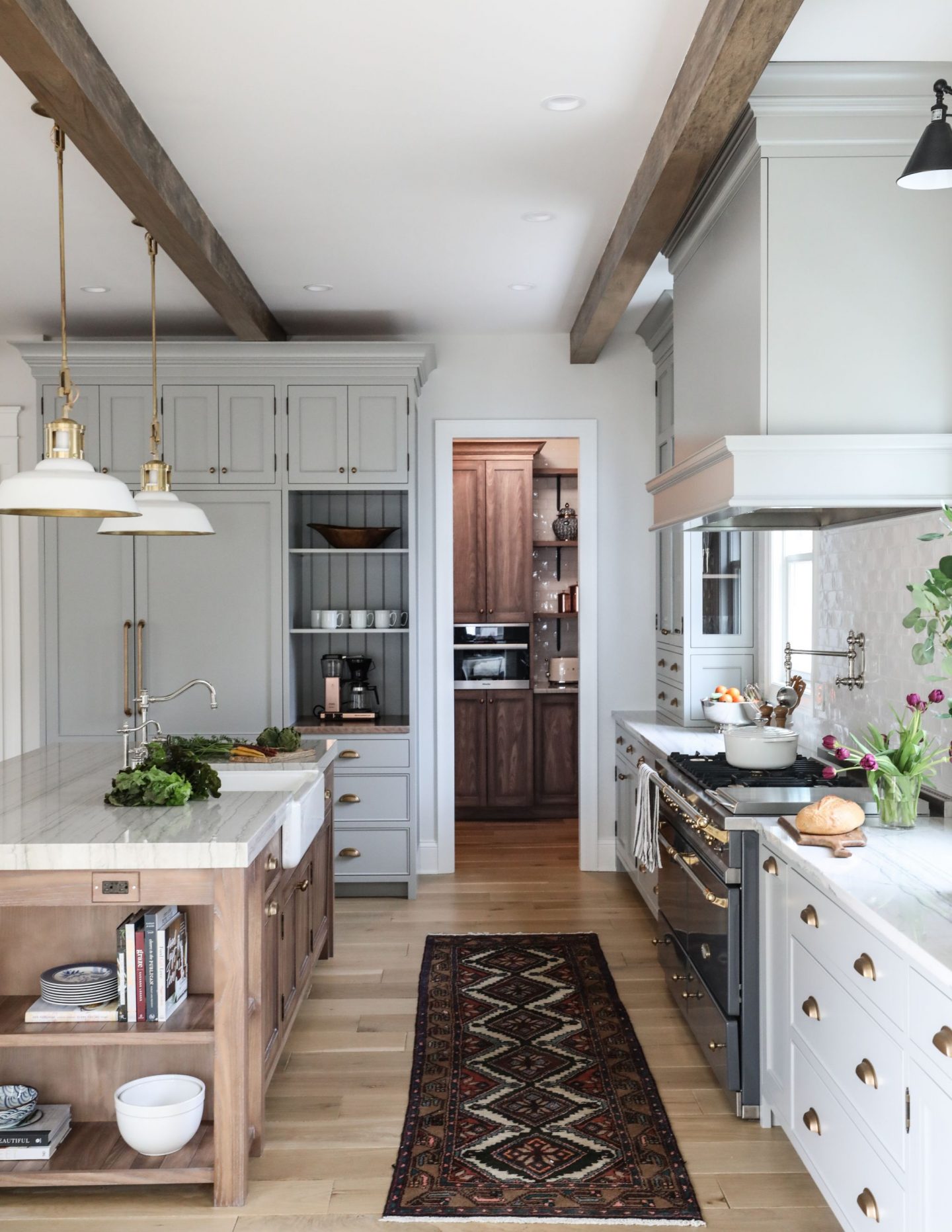 Lamp Room Gray Farrow & Ball painted cabinets in a timeless and classic kitchen by Park and Oak. Click through for Perfect Light Gray Paint Colors You'll Love as Well as Interior Design Inspiration Photos.