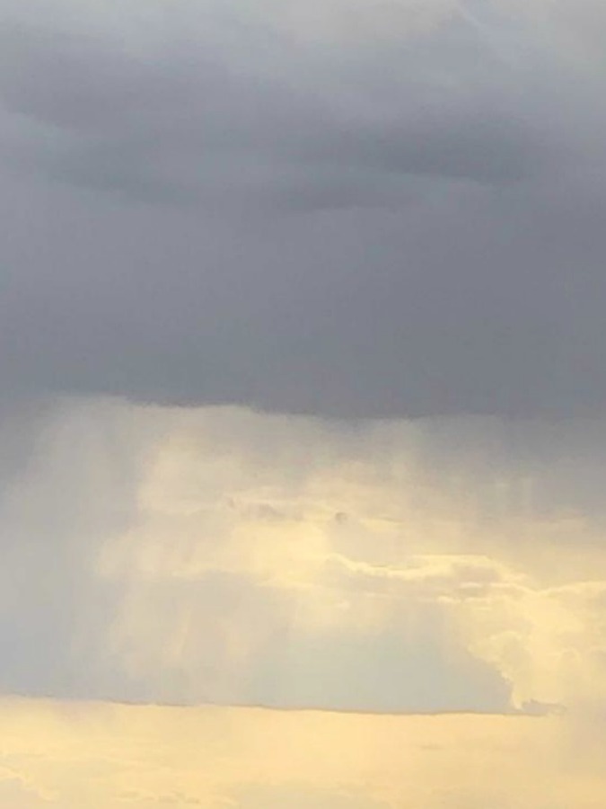 Heavenly clouds and rain in the sky in Arizona - Hello Lovely Studio.