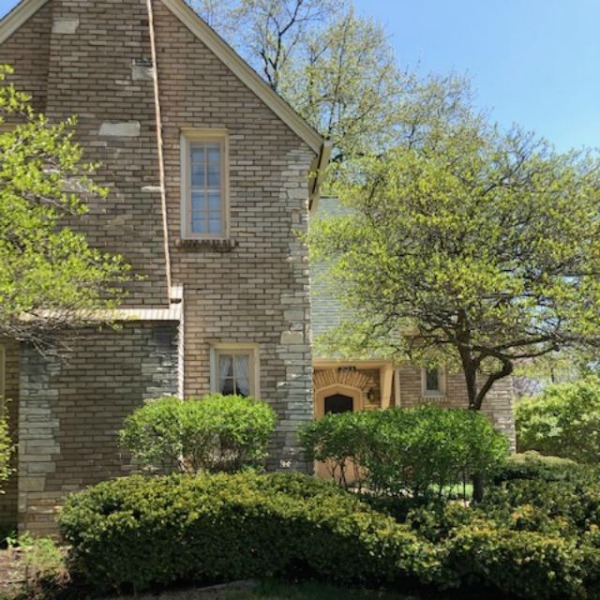 Charming vintage home exterior in Spring. Hello Lovely Studio.