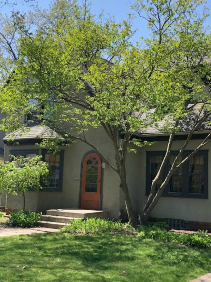 Charming vintage home exterior in Spring. Hello Lovely Studio.