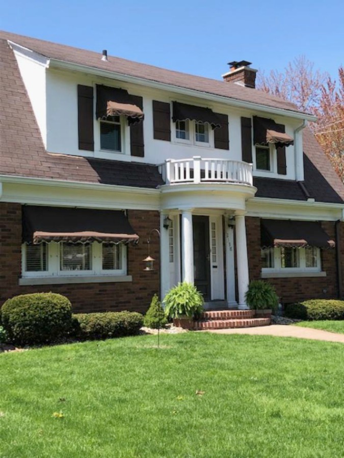 Charming vintage home exterior in Spring. Hello Lovely Studio.