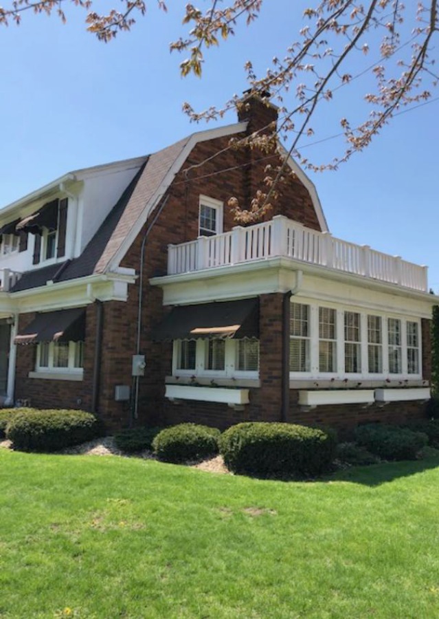 Charming vintage home exterior in Spring. Hello Lovely Studio.