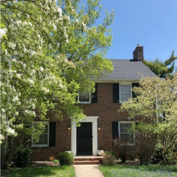 Charming vintage home exterior in Spring. Hello Lovely Studio.