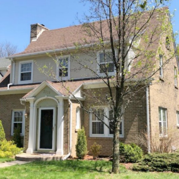 Charming vintage home exterior in Spring. Hello Lovely Studio.