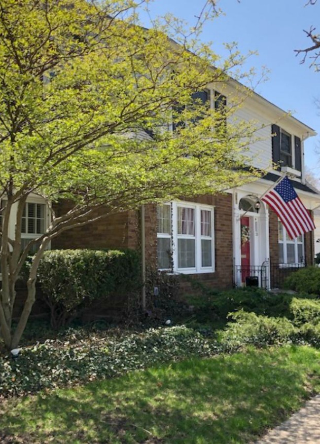 Charming vintage home exterior in Spring. Hello Lovely Studio.