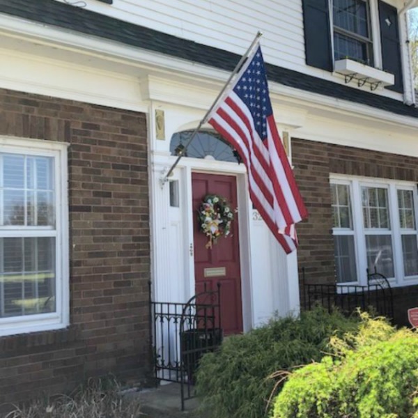 Charming vintage home exterior in Spring. Hello Lovely Studio.