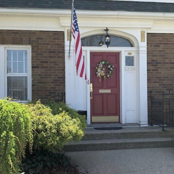 Charming vintage home exterior in Spring. Hello Lovely Studio.