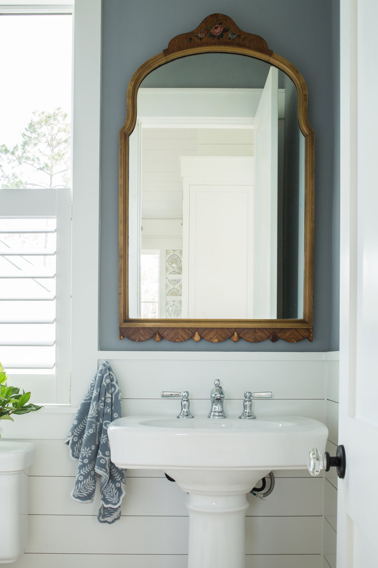 Andes Summit (Benjamin Moore) paint color on wall in coastal cottage bathroom with pedestal sink. Design: Lisa Furey. #andessummit