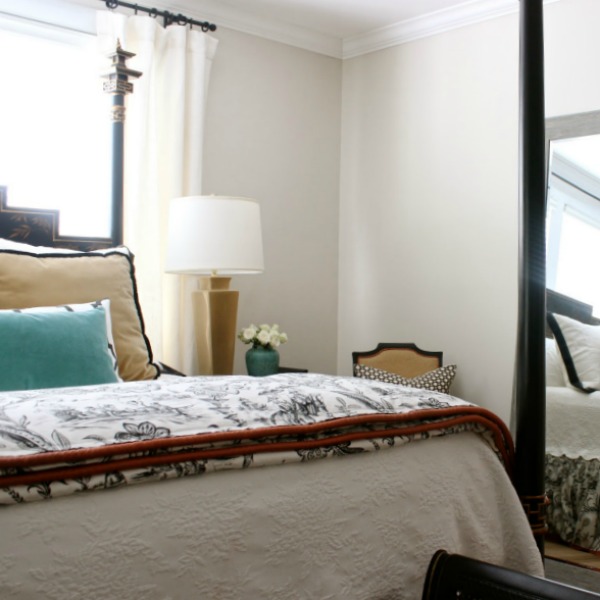 Benjamin Moore Natural Cream paint color on bedroom designed by Sherry Hart.
